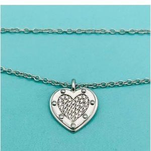 Tiffany and co white gold tag key bracelet